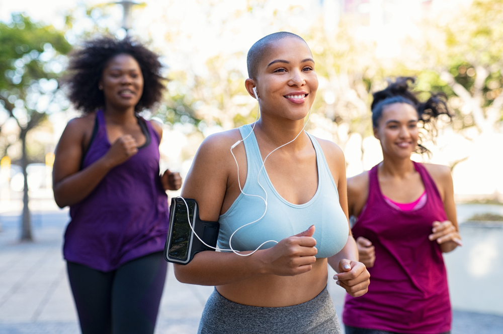 Happy group of overweight friends exercising together and taking GLP-1 for weight loss