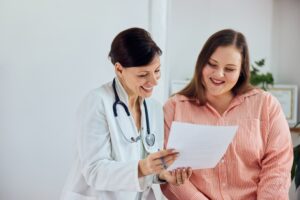 Doctor and patient weight loss consultation GLP-1 evaluation