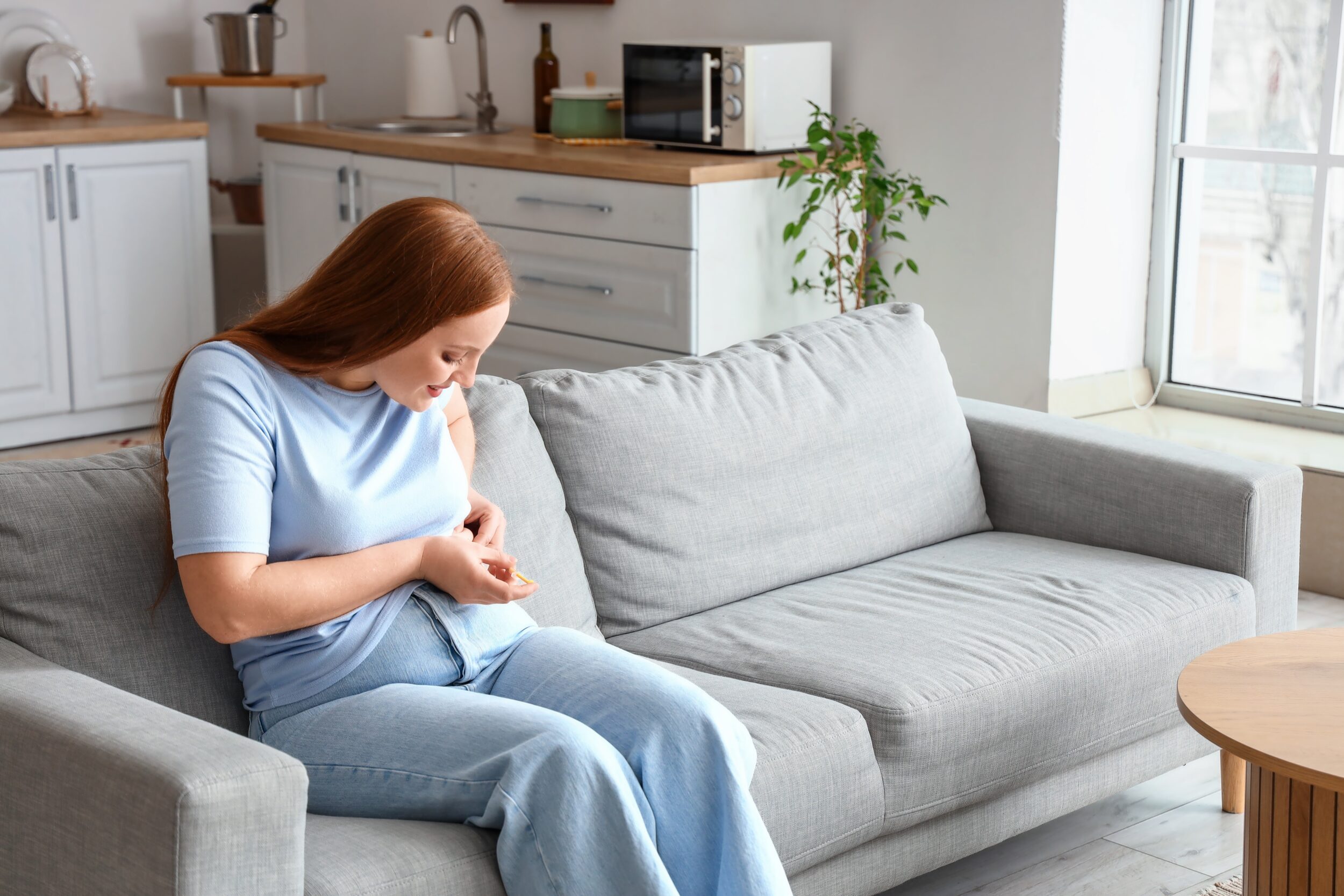 Woman administering compounded GLP-1 at home